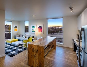 Henry Apartments Relaxing Resident Lounge with Kitchenette and TV